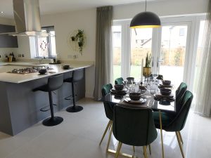 Example kitchen and dining area with French doors to garden